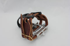 Brown double toe clip straps (pedals and clips not included)